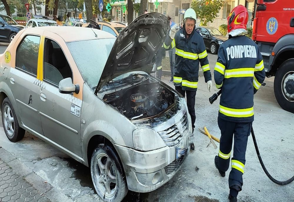 Incendiu autoturism, panică pe stradă
