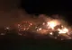 Incendiu violent în  Axintele. Pompieri din două județe se luptă cu flăcările