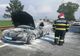 FOTO Mașină în flăcări la stația de taxare de la Giurgeni
